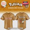 Tan baseball jersey featuring Pokemon 30th anniversary design with Charizard, Pikachu, and the text 'Brewers'.!