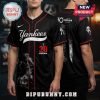 Black baseball jersey with 'Yankees' in script, '30 Scream', Ghostface, and a list of names on the back.!