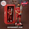 Mohamed Salah figurine in Liverpool kit holding a trophy, packaged in a display box!