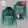 Green hoodie with Mumford & Sons band member pics and tour dates. Music merch!