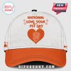 White and orange baseball cap with National Love Your Pet Day text, paw prints, and SF Giants heart logo.!