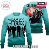 Teal Pixies band sweatshirt. Graphic text: 'Pixies'. Band members shown. Tour dates listed on back!
