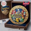 Gold coin in box featuring Pikachu, Bulbasaur, Squirtle, Charmander, and text Pokemon 30th Anniversary Gotta Catch 'em All! Retro style!