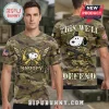 Camo tee with cartoon dog Snoopy as U.S. Army soldier; text: THIS WE'LL DEFEND!