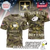 Camo tee featuring Snoopy as a U.S. Army soldier, wings, and the text: THIS WE'LL DEFEND and SNOOPY!
