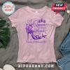 Pink shirt with graphic: A Queen was born in March. Features a crown, butterflies, and a high heel shoe illustration.!