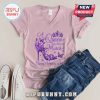 Pink v-neck t-shirt with 'A Queen was born in March' graphic featuring a purple high heel and butterflies.!