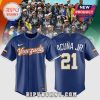 Navy baseball jersey with 'Venezuela' in gold script and 'Acuña Jr. 21' on back! Venezuelan flag on sleeves!