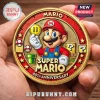 Red and gold Super Mario 40th Anniversary coin showing Mario, mushrooms, and question blocks!