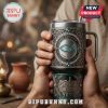Silver Yeti mug with 'The Chosen' logo and a Jerusalem design, held by a person.!