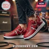 Red custom sneakers, black and white diagonal stripe pattern, stylized VF logo, AIR text! Edgy rock music inspired footwear!