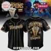 Black baseball jersey: 'Venezuela Champions' in gold font, Venezuelan flag. 2026 World Baseball Classic theme!