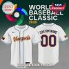 White World Baseball Classic 2026 jersey. Front: 'Venezuela' in script. Back: 'Custom Name' above '00'. Flag of Venezuela on sleeves!