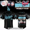 Black baseball jersey with light blue Dodgers text and a 5 Seconds of Summer Everyone's A Star World Tour graphic with band photo!