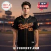 Black and orange baseball jersey with 'Dodgers' script text and number '00' on the front!