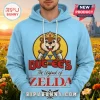 Light blue hoodie with Buc-ee's beaver mascot as Link from Zelda holding the Triforce and red text 'Buc-ee's The Legend of Zelda'!