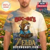 Buc-ee's beaver as Link from The Legend of Zelda t-shirt! Red and gold text on a blue and white scenic background!