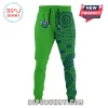 Green joggers with a Viking head logo on one leg and a blue Aboriginal art style dot pattern on the other split-leg design!