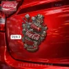 Gothic red Coca-Cola can car emblem with silver skulls, dripping liquid, ice, and 