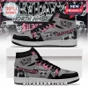 Grey, black, and pink high-top sneakers with grunge graphics, skulls, and text reading Suicide Boys and grey*59!