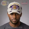 Distressed beige cap, purple and yellow Los Angeles Lakers logo, with '80th ANNIVERSARY' and '1946-2026' text!