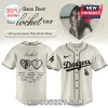 Cream Dodgers-style baseball jersey for Madison Beer The Locket Tour with black script and a heart locket graphic on the back!