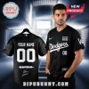 Custom black Martin Garrix Dodgers baseball jersey with white logos, text 'Dodgers', 'Garrix', and signature on the back!