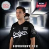 Black Dodgers baseball jersey with white script text, Martin Garrix +x logo, and a geometric sleeve graphic!