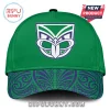 Green baseball cap with a white and blue stylized Maori mask logo! Dark blue tribal pattern on the brim!