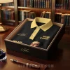 Black and yellow Noah Kahan polo shirt in a gift box! Features musician's face, 