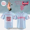 Light blue and pink SF Giants baseball jersey with Olivia Rodrigo graphics and lyrics 'you seem pretty sad for a girl so in love'!