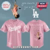 Pink Dodgers baseball jersey with Olivia Rodrigo on the back and text 'you seem pretty sad for a girl so in love'!