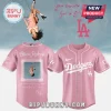 Pink Olivia Rodrigo Dodgers baseball jersey with her photo and 'you seem pretty sad' lyrics on the back in white script!