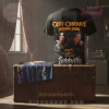 Black t-shirt with orange/yellow vintage heavy metal style text 