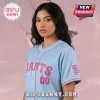 Light blue and pink Giants baseball jersey with the number 00 and an SF logo on the sleeve!