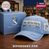 Light blue distressed dad hat with a white patch reading PHI DELTA THETA EST. 1848 and a fraternity crest patch on the side!
