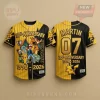 Black yellow striped Pokemon 30th Anniversary baseball jersey with Ash, Pikachu, Charizard, Squirtle, Bulbasaur, Charmander, Butterfree, text '30th ANNIVERSARY 1996-2026 PIKACHU MARTIN 07'!