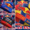Blue Red Bull beanie, black Oracle Red Bull Racing Nike beanie, and a patchwork Red Bull logo Nike beanie are displayed! Red Bull text and iconic bull logo appear prominently!
