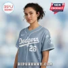 Light blue Dodgers baseball jersey with white script text, number 26, and a LUZ peace sign logo on the sleeve!