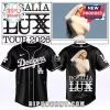 Black Dodgers baseball jersey for Rosalía LUX TOUR 2026 with her photo on the back and white text graphics!
