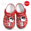 Red and white clogs! Featuring Snoopy in shades with a splashing Coca-Cola can, surrounded by Coca-Cola text in many languages!