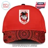 Red baseball cap with the St. George Illawarra Dragons logo and a black Indigenous dot art pattern on the brim!