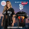Black SF Giants baseball jersey with GIANTS on front and a Supergirl graphic with SUPERGIRL text on back!