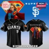 Black San Francisco Giants baseball jersey with Supergirl graphic on back! White text reads 'GIANTS' and 'SUPERGIRL'! Red S logo!