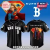 Black Boston Red Sox baseball jersey with a Supergirl graphic on the back and the text 