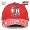 Red Sydney Roosters logo cap with a white and red Indigenous dot art pattern on the brim!