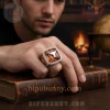 Bold gold men's longhorn ring featuring an amber faceted stone, silver bezel, and clear accent stones! Statement style!