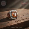 Ornate silver championship ring with amber gem, white Texas Longhorns logo, 