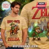 Tan t-shirt with an 8-bit pixel art mashup of Buc-ee's beaver as Link from The Legend of Zelda with red logo text!