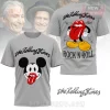 Grey t-shirt with Rolling Stones script logo and Mickey Mouse tongue and lips mashup! Back has cartoon lips with band signatures and ROCK N ROLL text!